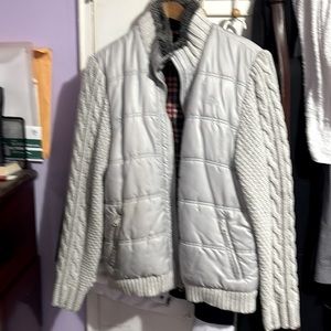 Warm, white, with light sweater looking sleeves but warm like puffy jacket